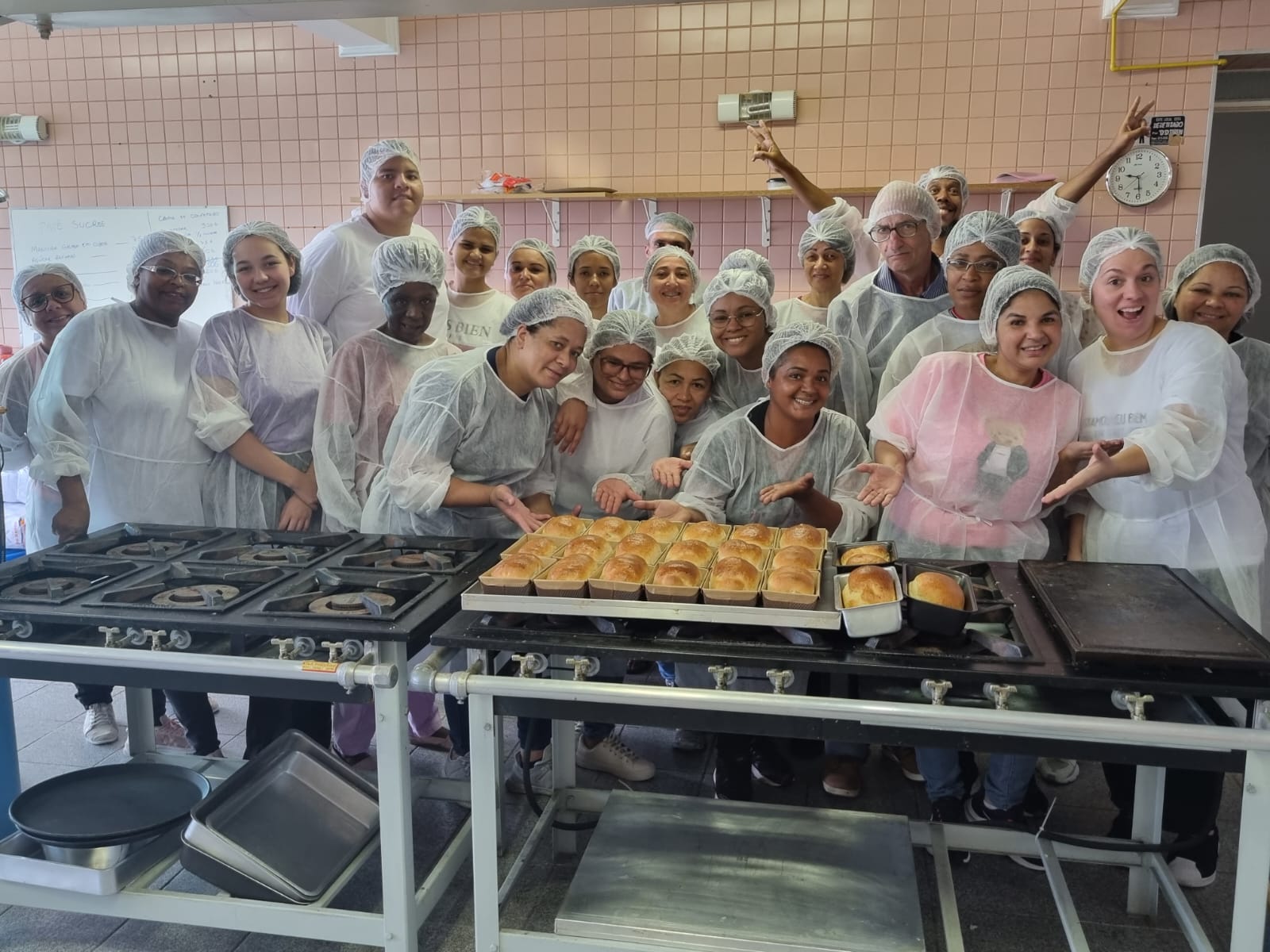 group picture of the baker training participants happily posing