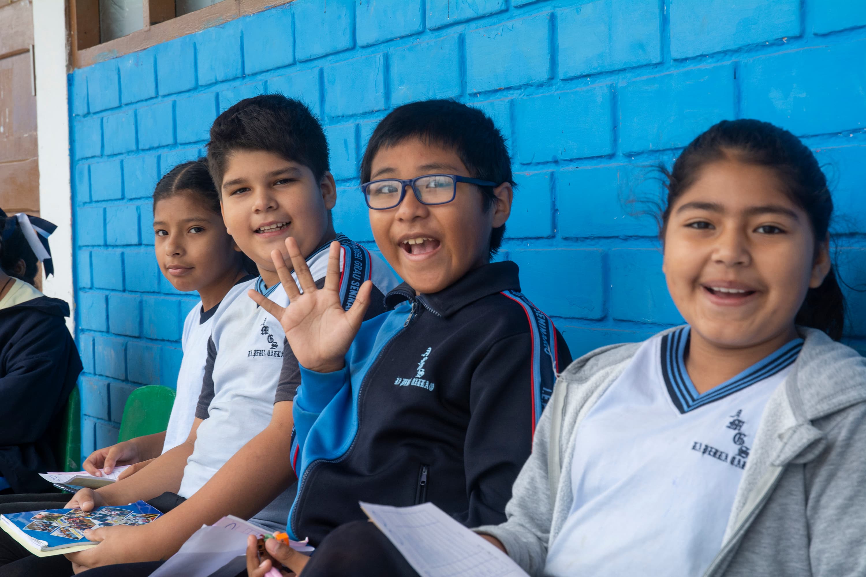 children in Peru happily smiling during a vision campaign