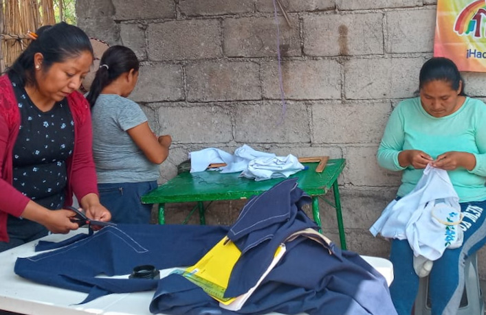 3 women seing clothes